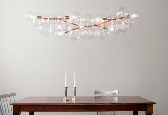 A luz de bulbos de vidro amarra os candelabros do hotel decorativos com sua maneira para a sala de jantar