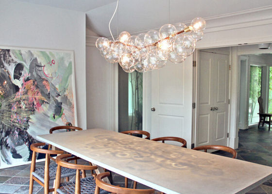 A luz de bulbos de vidro amarra os candelabros do hotel decorativos com sua maneira para a sala de jantar